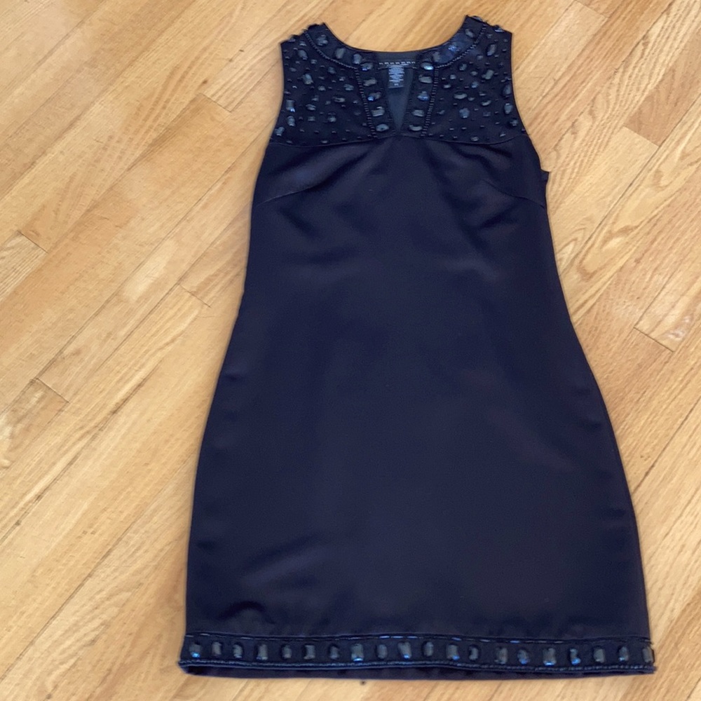 Adorable black dress with neck detail